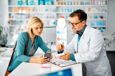 pharmacist talking to patient